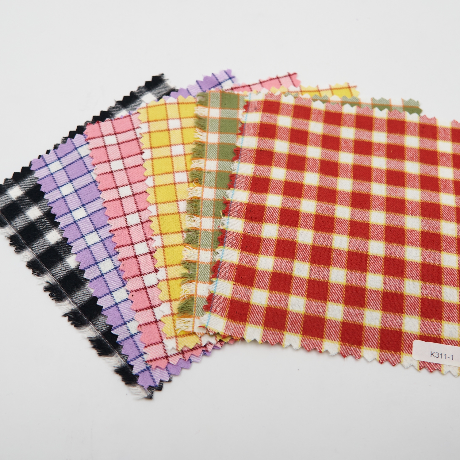 hand-dyed fabric crossword clue